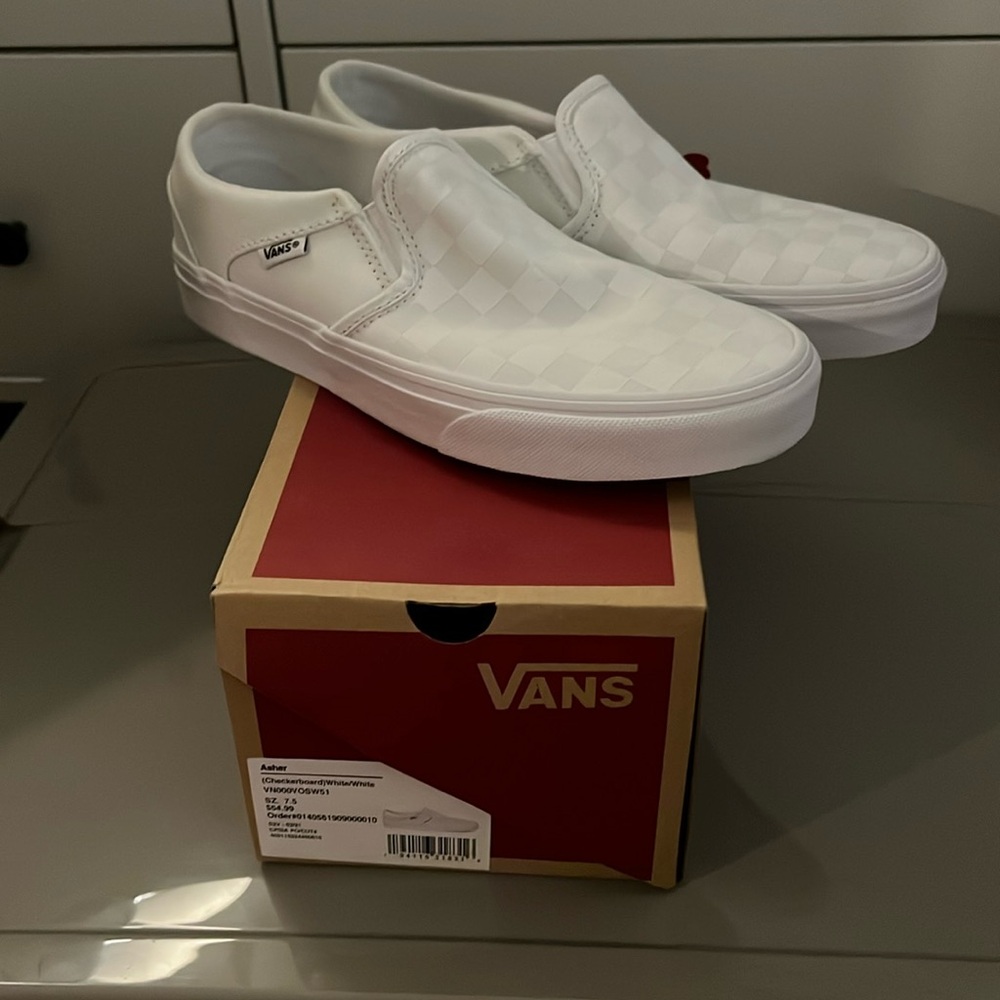 NWT Checkerboard White on White Vans slip on sneakers.